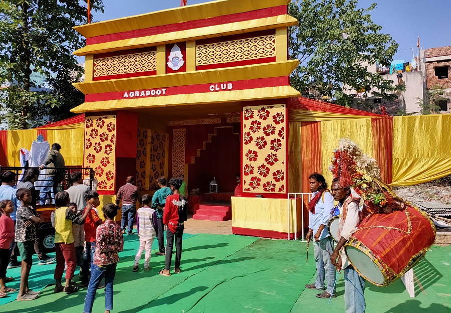 Members of Agrodoot Club Tharpakna move the Idol inside the Puja pandal, in Ranchi on Saturday. 