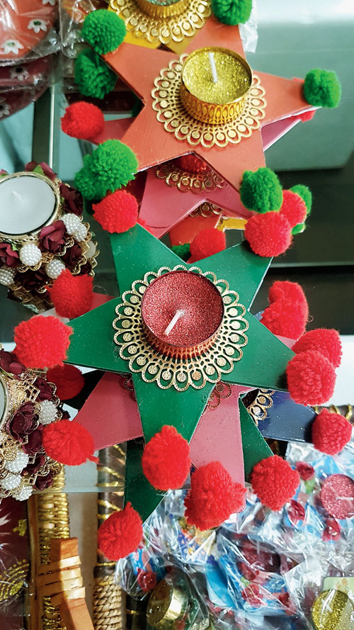 Wooden candle stands at Parampara, CB Block