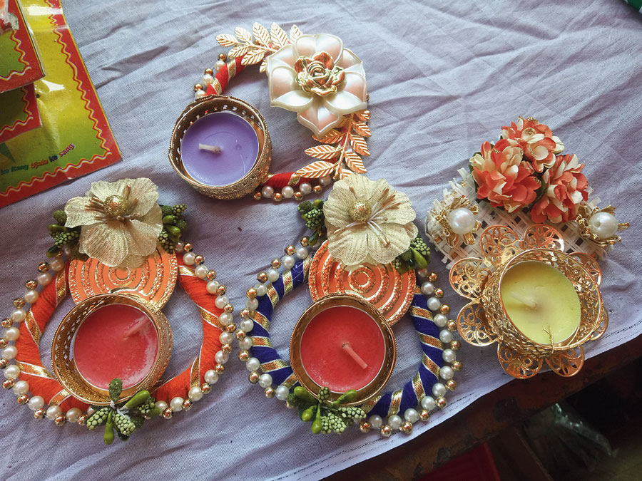 Ornamental candle holders at Needs, Baisakhi.