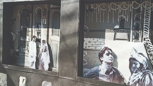 The walls on both sides were done up with posters from Apur Sansar, in which Soumitra Chatterjee debuted
