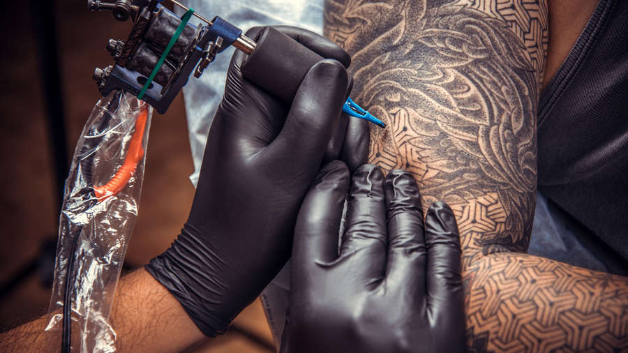 Infected Tattoo Stages Signs Treatment What to Expect