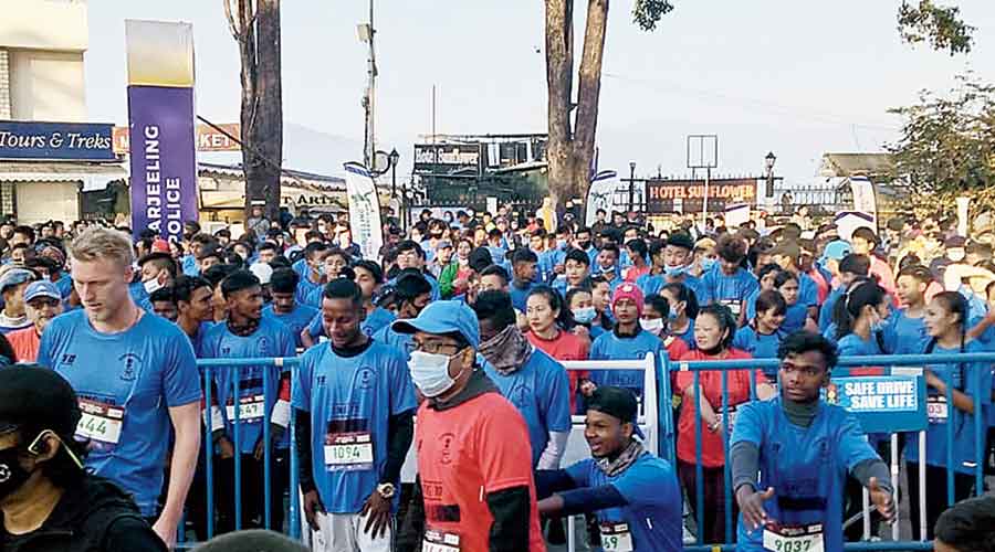 Runners at the starting point of the marathon — with the theme “Time to R-UNLOCK” — at Chowrasta in Darjeeling on Sunday