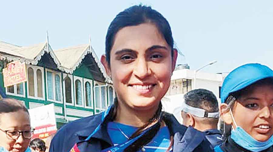 Tejasvi Rana, an IAS officer who is now the SDO of Kalimpong, beams as she displays her “finishing medal” after completing her 10km run