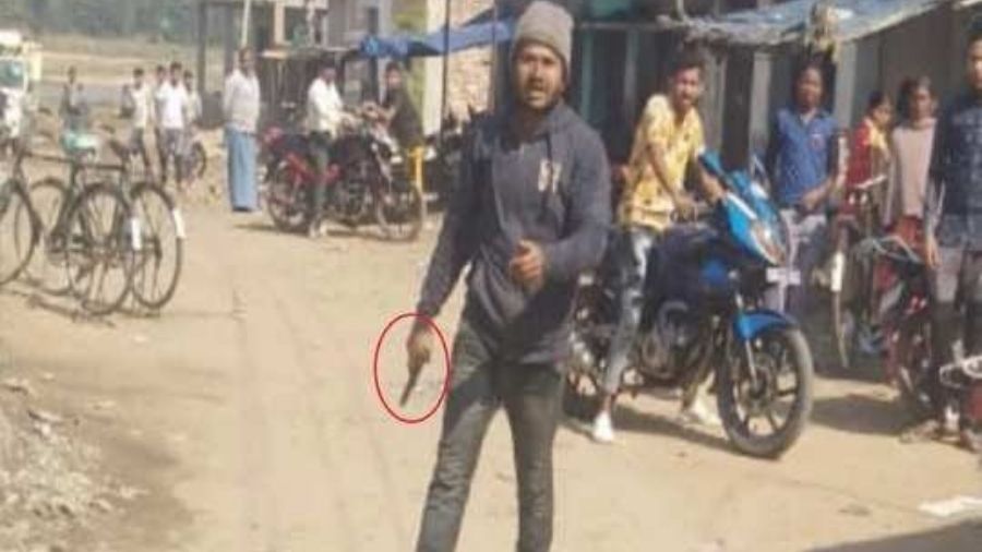 A picture of Vikas Kumar Vicky carrying the revolver, which went viral on social media.