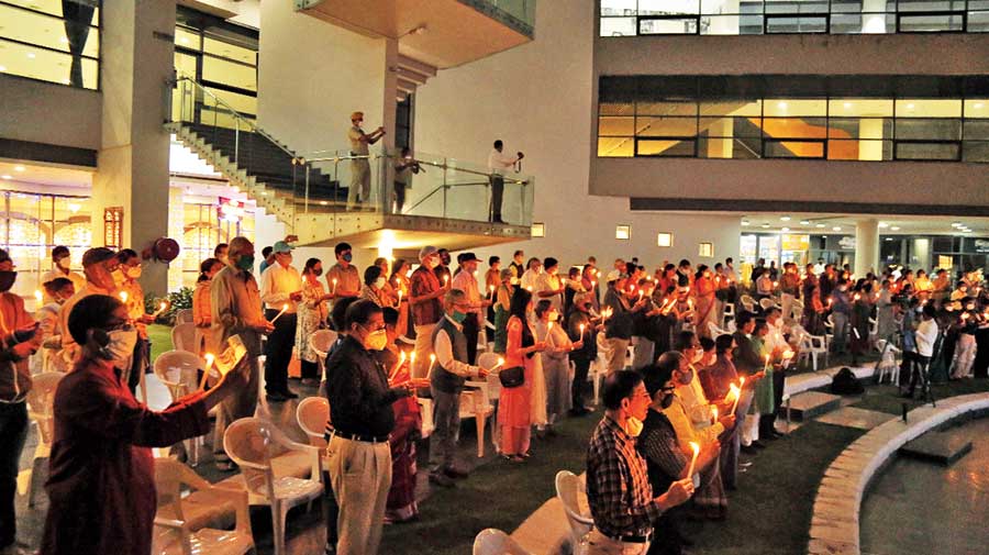 last bow: Candles lit in remembrance as the audience sings Aguner Poroshmoni in chorus