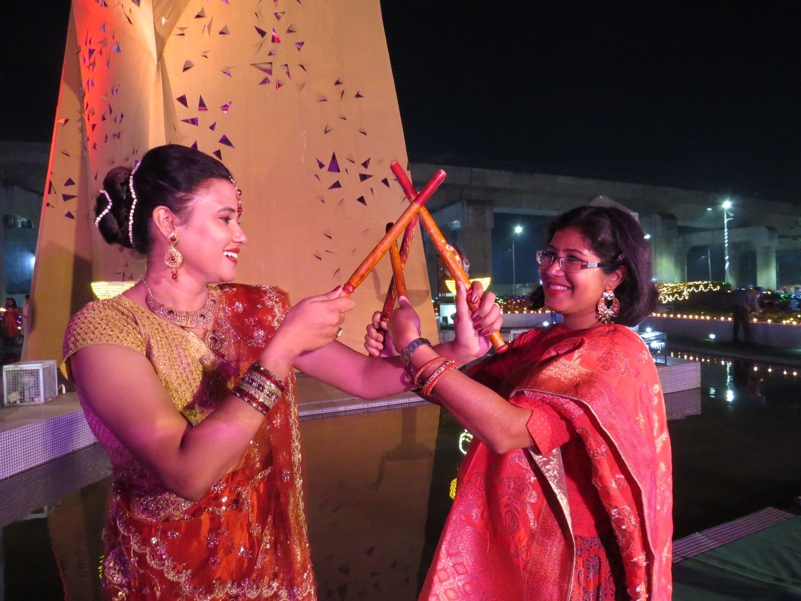Participants showcase dandiya moves.