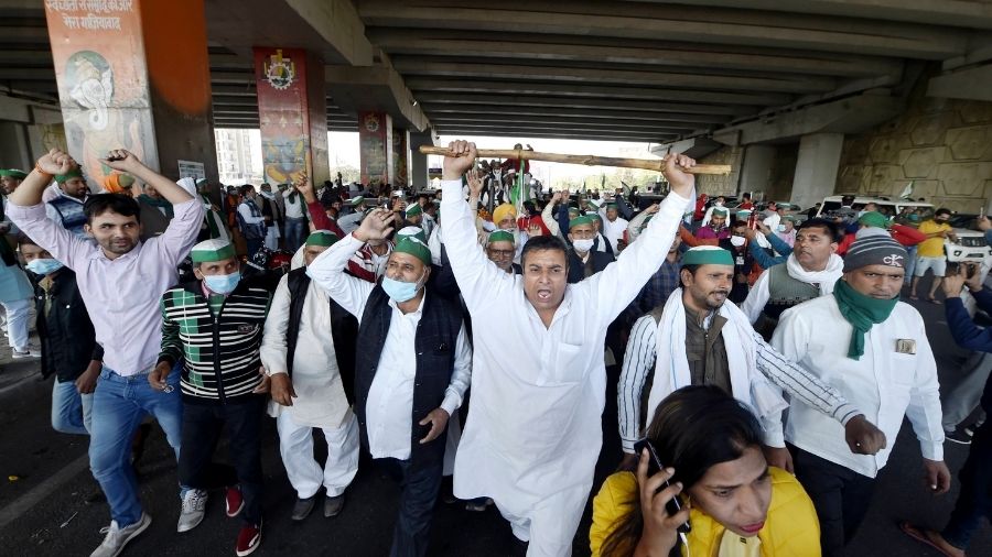 BKU members raise slogans during their protest at the Ghazipur border.