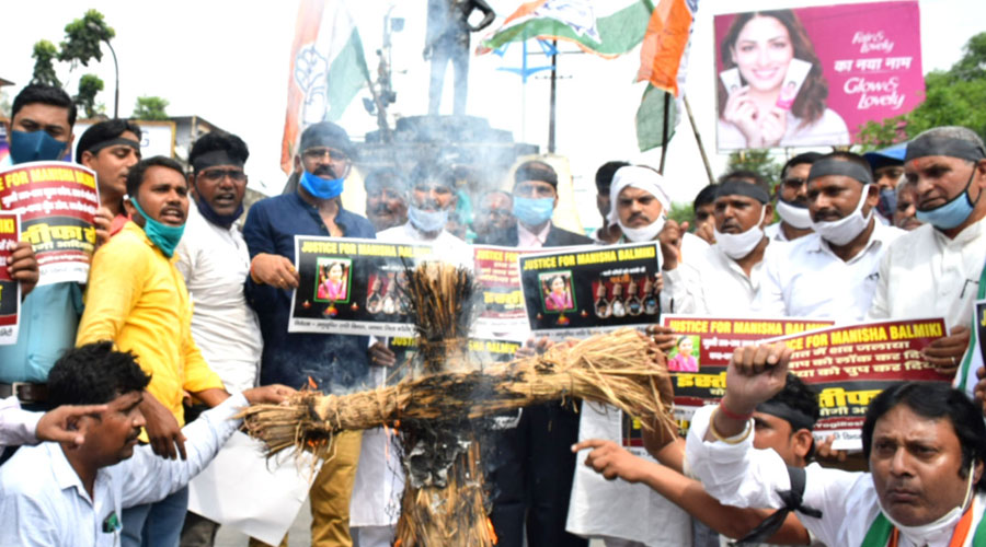 Congress activists Dhanbad burn effigies of Uttar Pradesh chief minister Adityanath Yogi at Randhir Verma Chowk in Dhanbad on October 1, 2020.