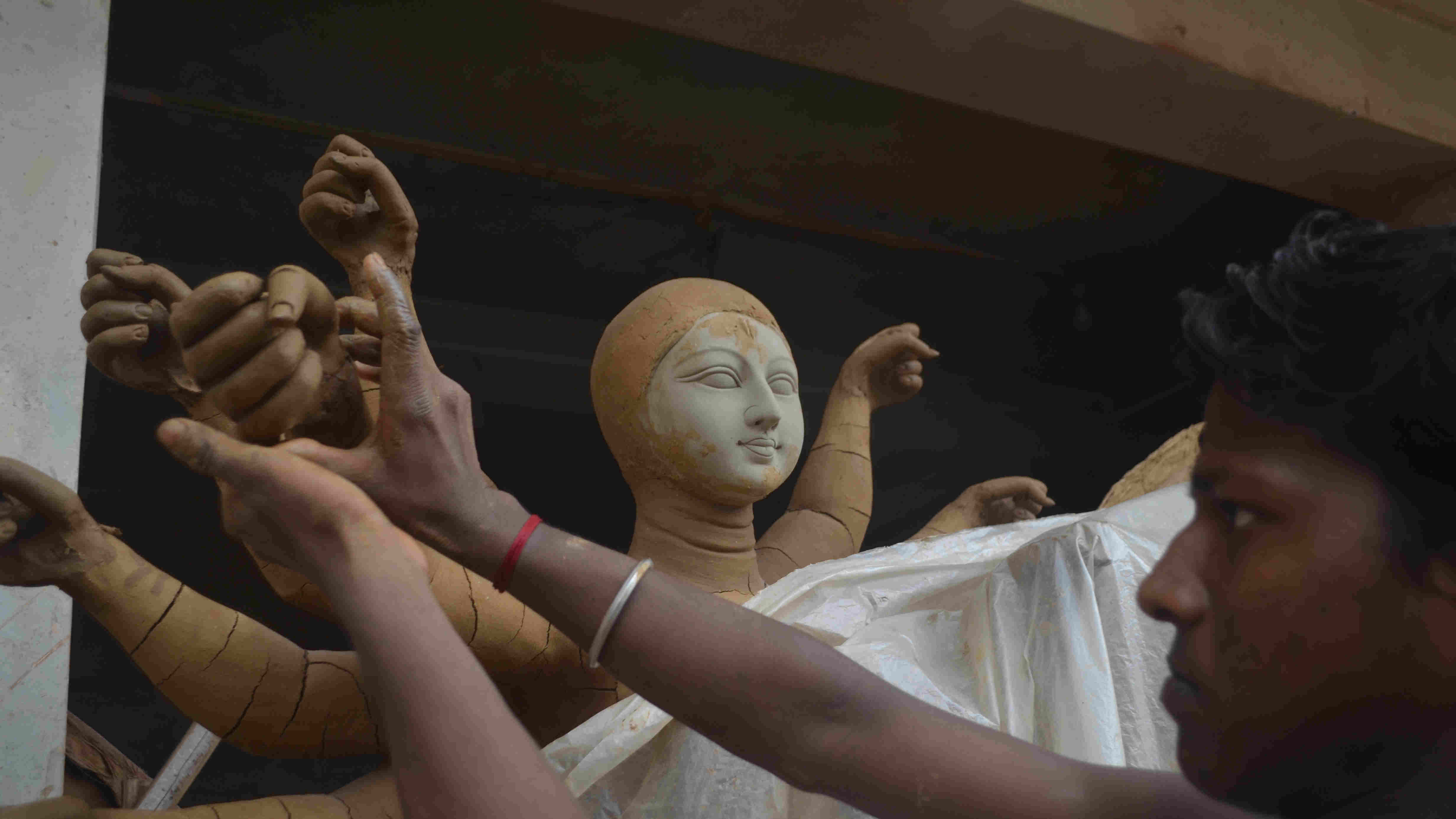  A worker making under four feet idol of Goddess Durga on a workshop after the Jharkhand Government announce norms for the ahead of Durga Puja during covid pandemic at Luby Circular road Dhanbad today.