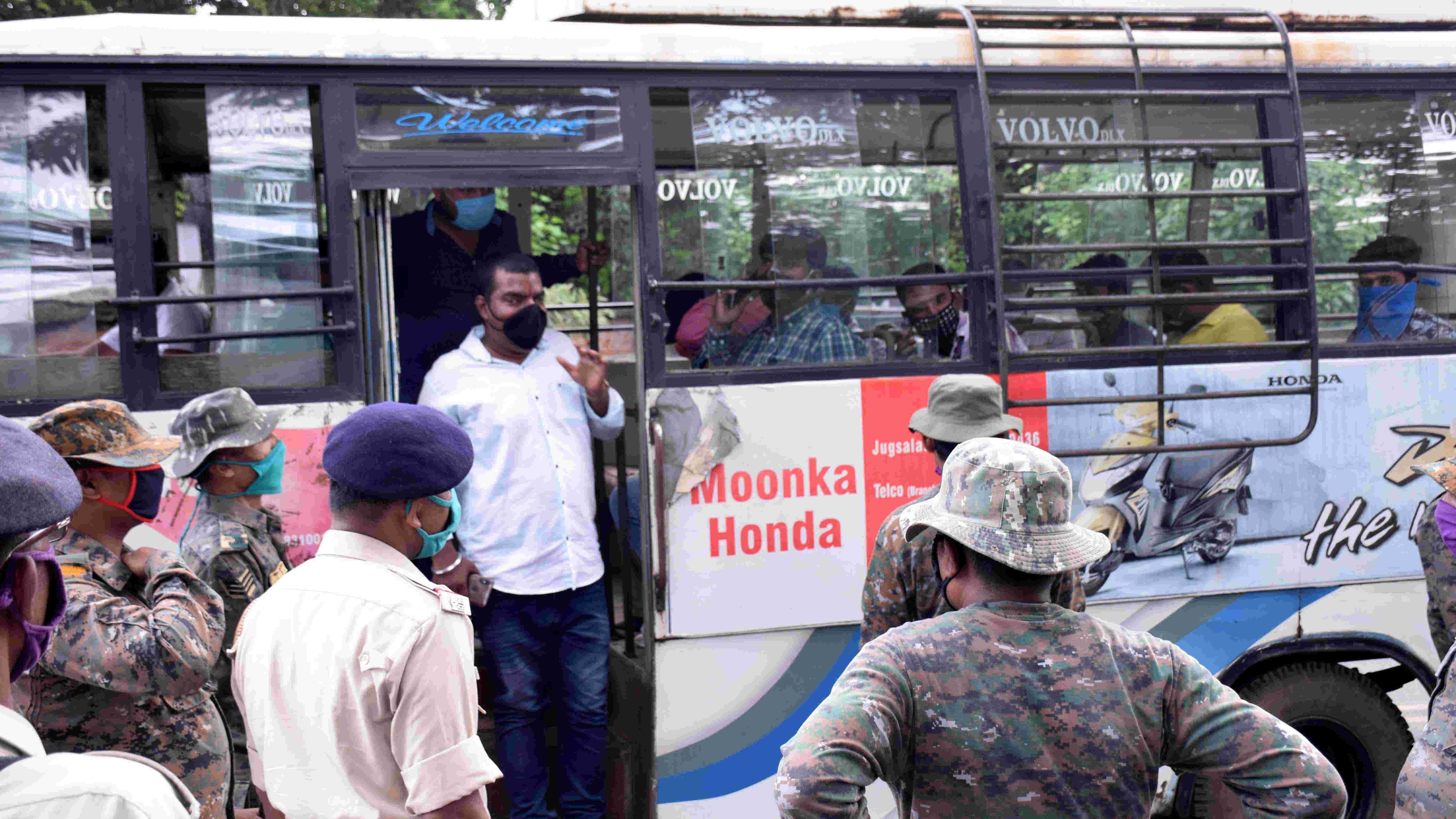 Protesters, who were detained, being put on a police van to be transported to a camp jail on Wednesday.