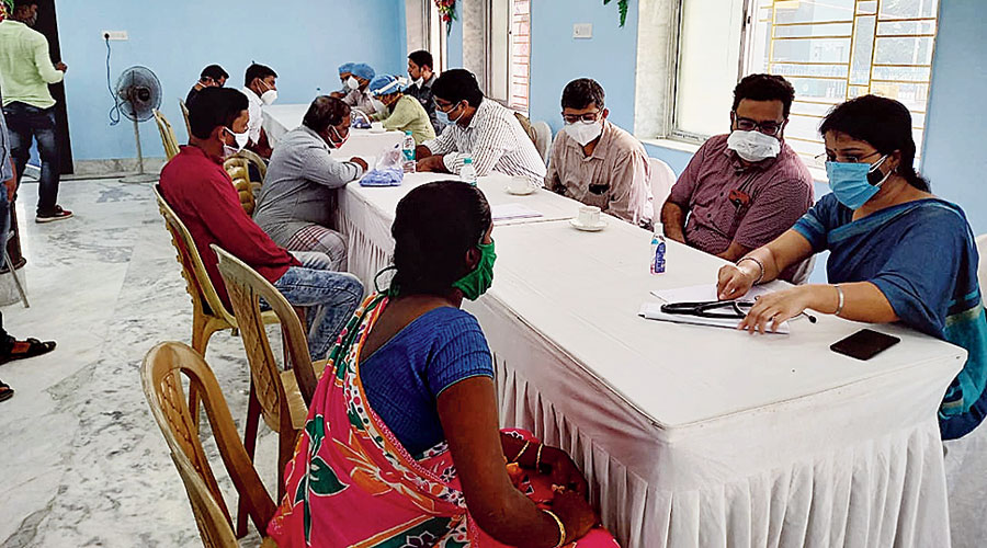 Doctors from Protect The Warriors attend to survivors in Duttabad on Sunday.