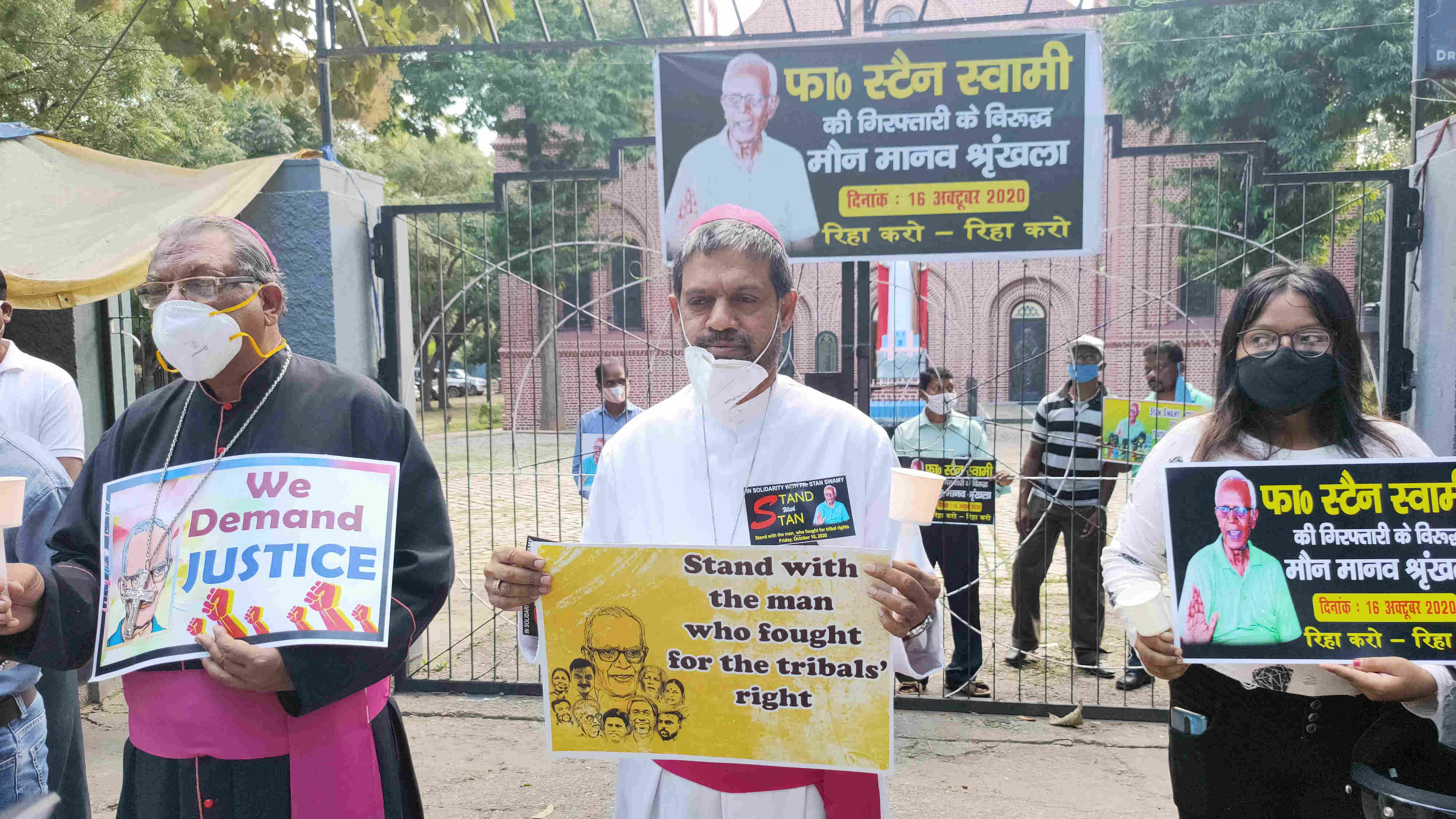 Archbishop Felix Toppo, Bishop Theodore Mascarenhas join a human chain on Purulia Road to demand the release of Stan Swami in Ranchi. 