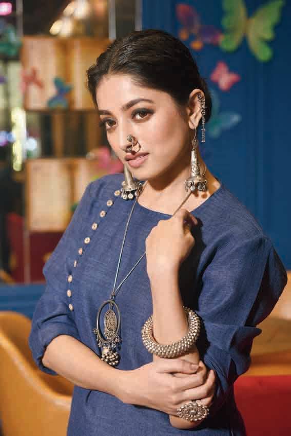 4.This look though closest to Ishaa’s personal style, was made different with the stunning silver jewellery from Karishmaz. Roja paired a Fanush by Roja jute-cotton kurta and crepe-cotton dhoti pants with loads of silver jewellery. The subtle make-up and a messy bun accentuated the earthy-chic factor further. “I wore a nath like this for the first time and accessorised with so much jewellery for the first time too,” said Ishaa. Roja felt accessories can make any basic outfit glam.
