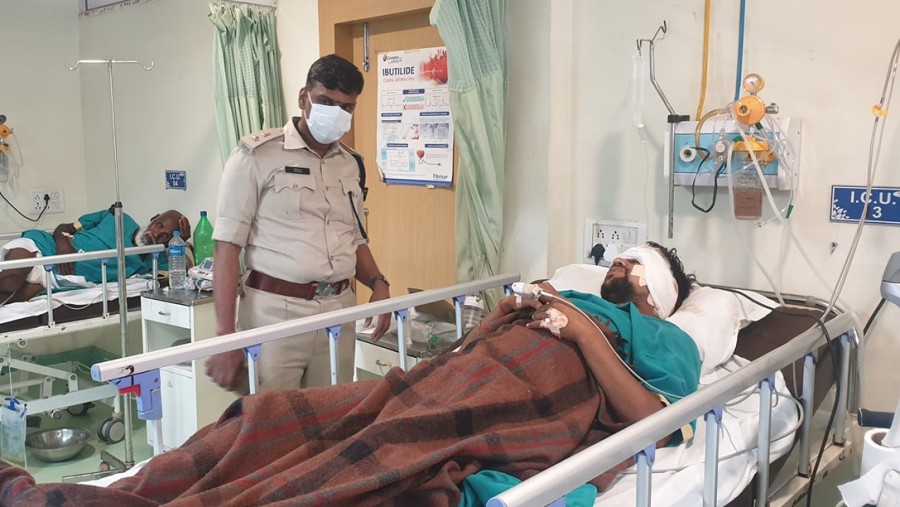 Hazaribagh superintendent of police Karthik S meets Singh at the private hospital on Saturday. 