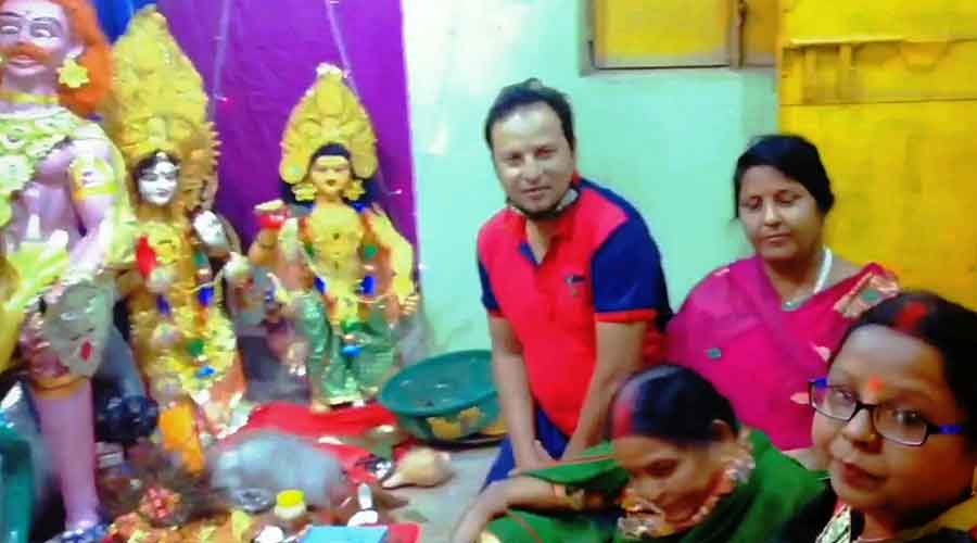 Shivdayal nagar mohalla resident Abhishek Bhushan Prasad with his family at his residential Puja