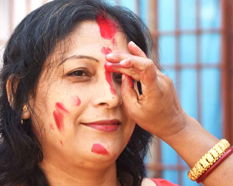 Sindoor Khela before the immersion procession at Hirapur Harimandir Saradiya Sammilani puja mandap
