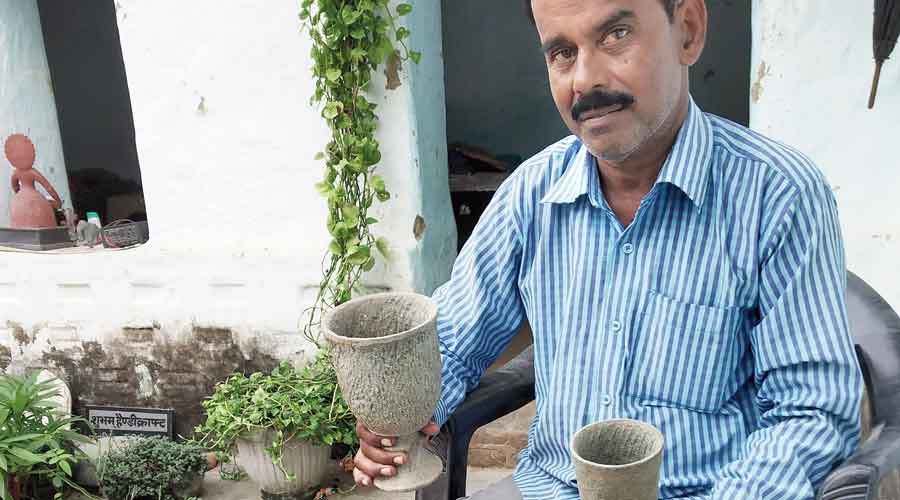 Sculptor Rabindra Nath Gour shows 200-year-old unfinished stone utensils