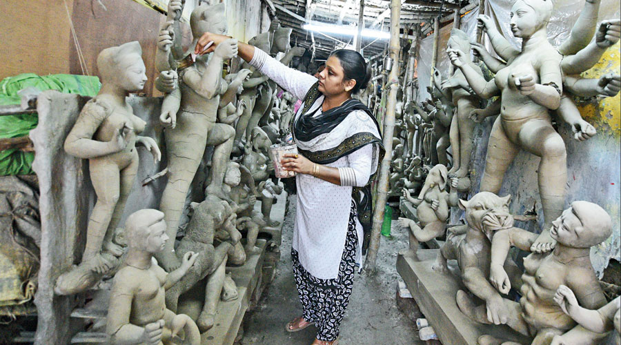 Piu Pal works on a Durga idol at her Kalighat studio on Saturday. 
