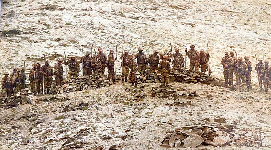 Soldiers of China’s People’s Liberation Army approach an Indian post near Mukhpari peak on Monday.