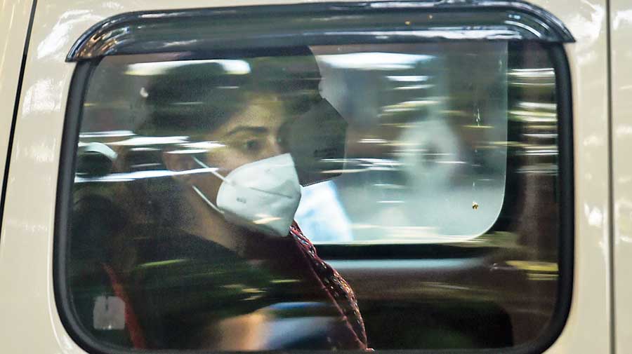 Rhea Chakraborty being taken for a medical test after her arrest in Mumbai.