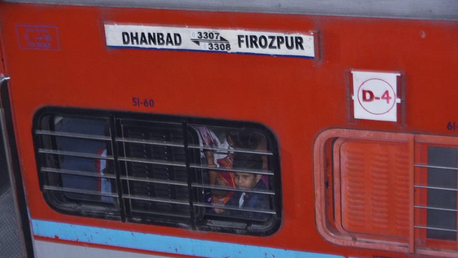 Passengers in the Ganga Sutlej Express before its departure from Dhanbad railway station on Saturday.