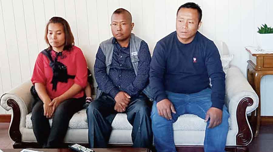 Lalrinngheta (centre) with his brother Lalrinpuia and sister Laleinawmni