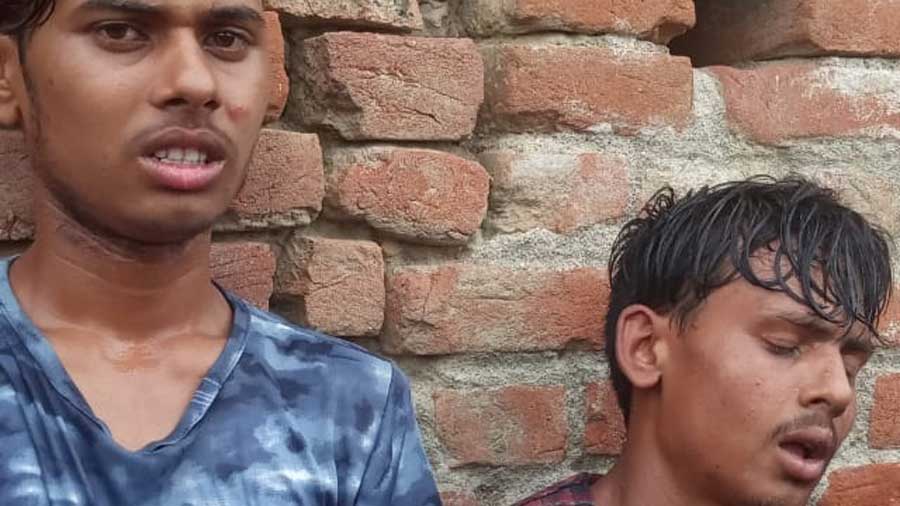 The two bag-snatchers caught by the villagers in Chatra. 
