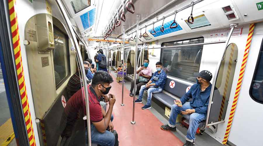 9.50AM: Passengers on a relatively empty Metro train  at Kalighat station on Monday