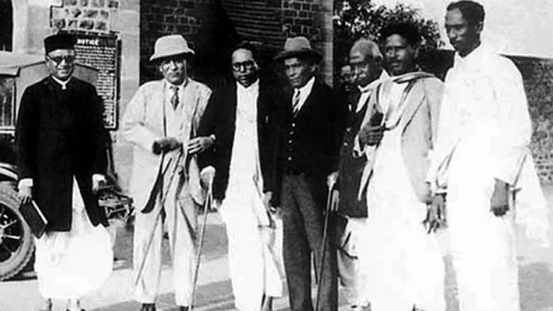 Dr Ambedkar with others during the signing of the Poona Pact.