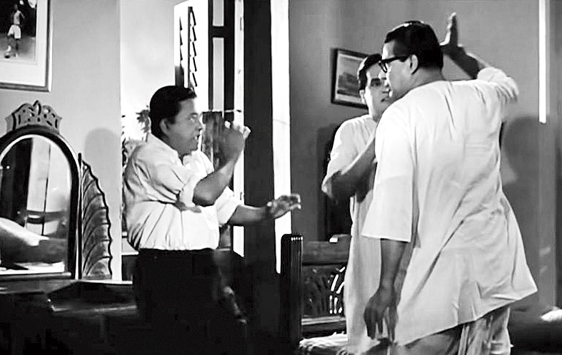 6. This is a hilarious scene involving a father-son duel. The father is of course very angry in this scene. Who is playing the father and who are playing the sons?