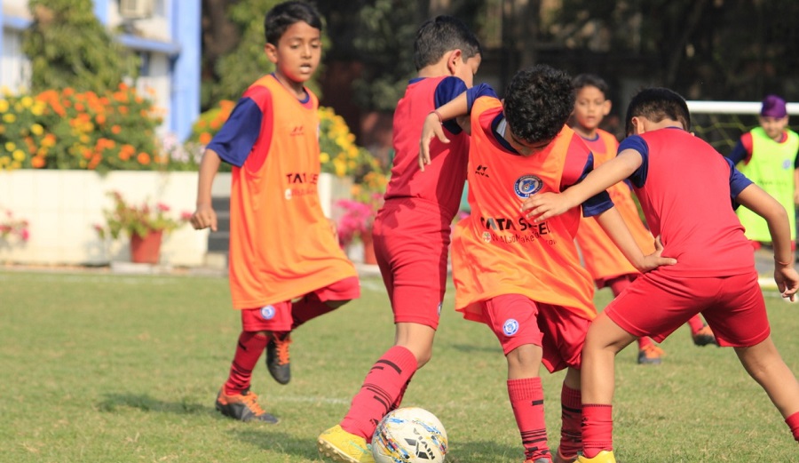 Children take part in a football tournament last year. 