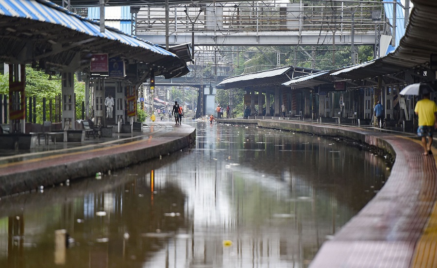 Waterlogged railway tracks at Chunabhatti railway station in Mumbai on Wednesday.