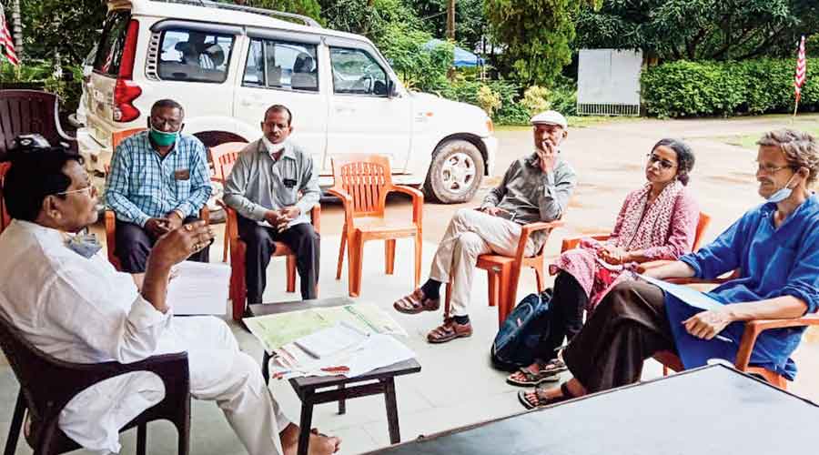 Economist Jean Dreze (extreme right) and others from the Right to Food Campaign during the meeting with Jharkhand food minister Rameshwar Oraon in Ranchi on Wednesday