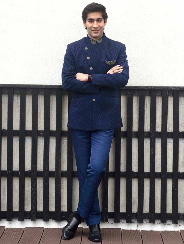 Ramit looks sharp in an all-blue look. The bandhgala has been asymmetrically cut and has a little bit of embellishment on the collar and front pocket. “Ramit looks terrific in this outfit. I see this is as a party look where you want to wear Indian,” says Ratul.