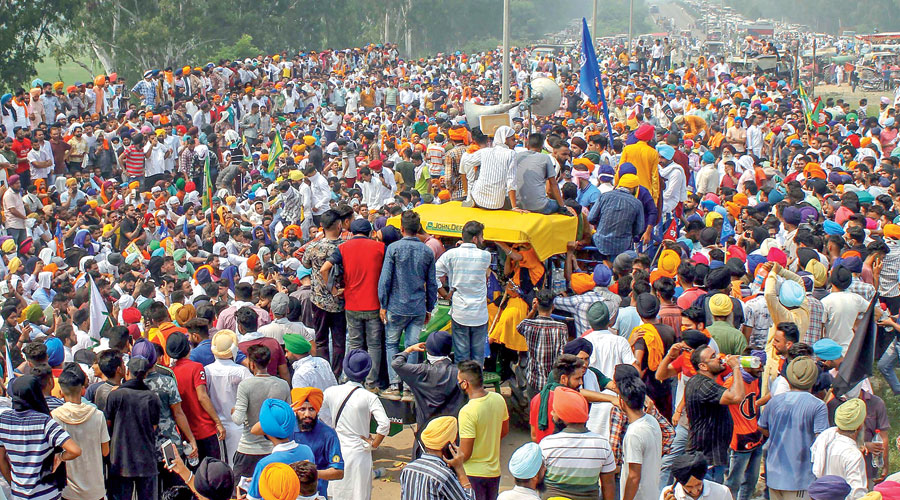 BJP workers thrash farm bill protesters - Telegraph India