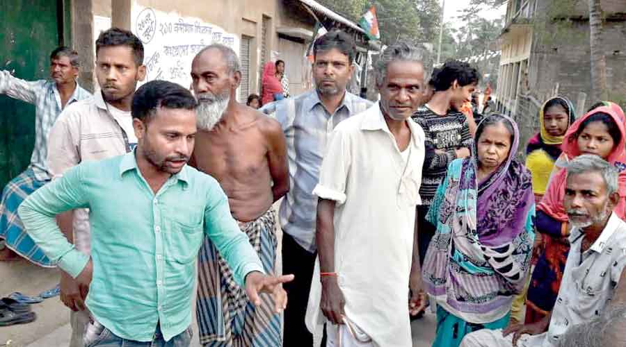 An enraged Sheikh Yasin (left) and others gather at Asadtala  in Nandigram on Monday to protest in front of Suvendu Adhikari’s convoy. 