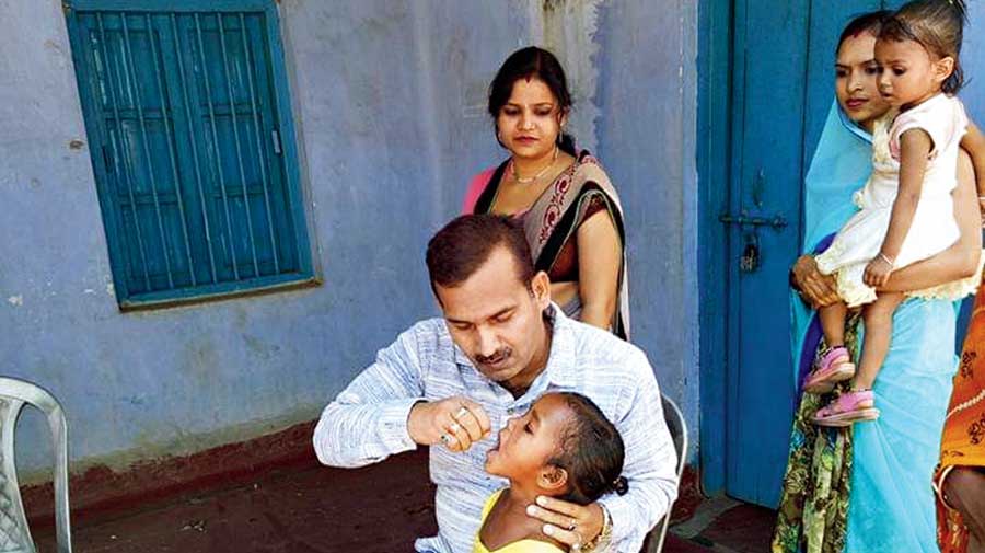 Ajay Kumar Singh , the pradhan of Bundu panchayat in Bokaro district, during immunisation drive among children