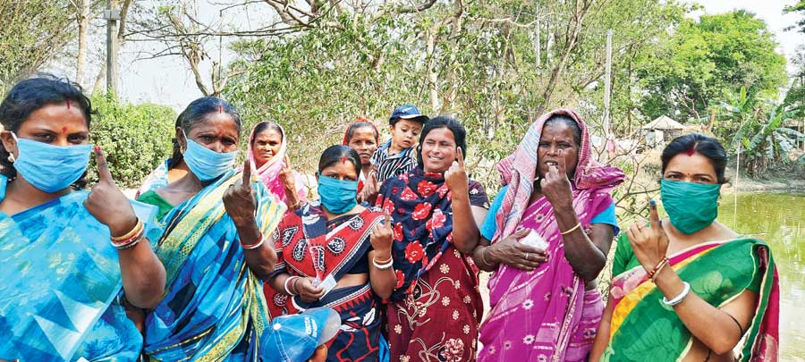 The eight women after casting votes at a booth at Khordda-Kanpur Primary School on Tuesday. 