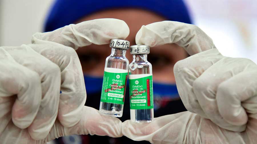 A medic shows the doses of Covid vaccine during an inoculation drive at a vaccination camp in Nagpur on Thursday.
