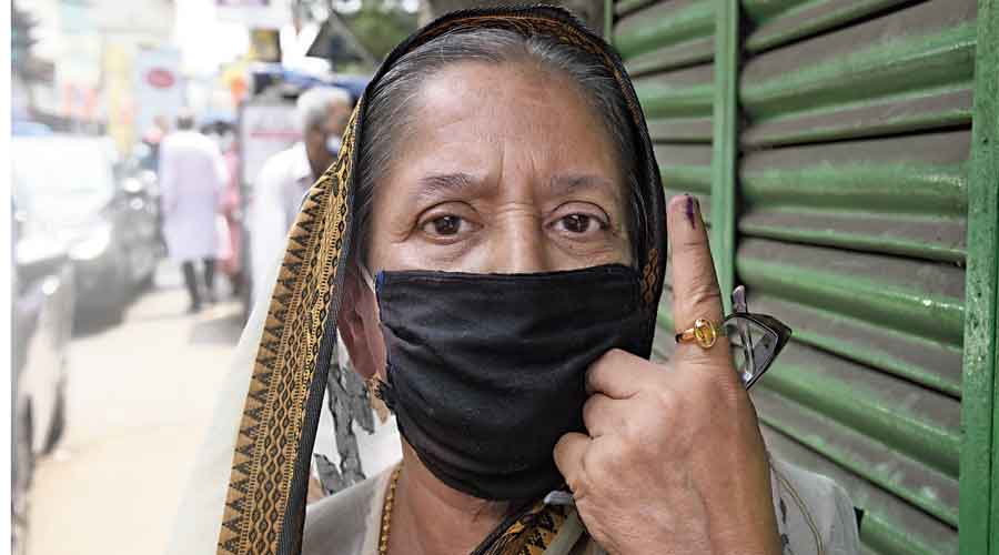 Chatterjee shows her inked finger after casting her vote