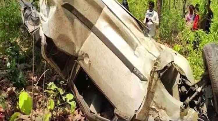 The damaged car at the accident site in Giridih