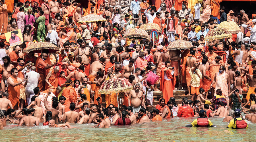 Devotees gather at Har Ki Pauri Ghat in  Haridwar to offer prayers during the Kumbh  Mela on Monday.