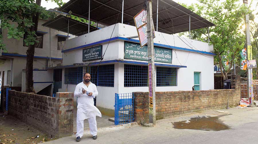 Partha Sarathi Basu outside Amanati mosque in Barasat. The leafy mosque compound stands on a narrow road in the Nabapally neighbourhood