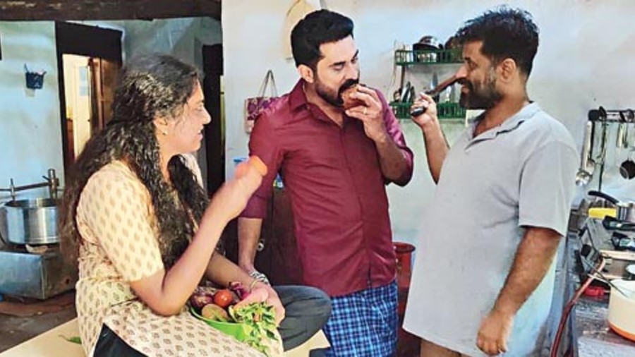 Jeo Baby (right) with actors Nimisha Sajayan and Suraj Venjaramoodu on the sets of The Great Indian Kitchen, streaming on Amazon Prime Video