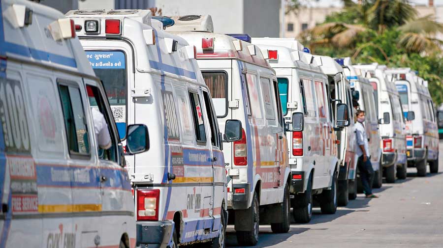 Ambulances with Covid-19 patients awaiting admission queue up outside Government Civil Hospital in Ahmedabad on April 21. 