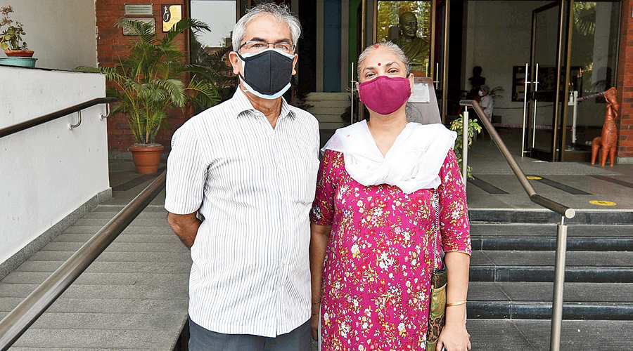 Debdatta and Kabita Mukherjee outside the polling booth at  South City International School