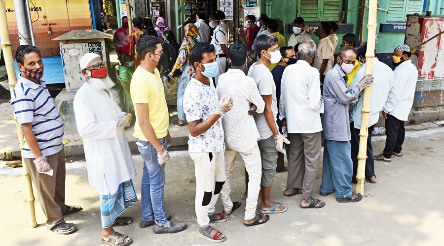 Social distancing norms not followed at a polling booth in Kidderpore.