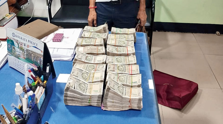    Unaccounted cash of around Rs 1.45 crore seized from eight persons in central Calcutta