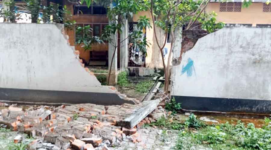 A boundary wall damaged in the quake