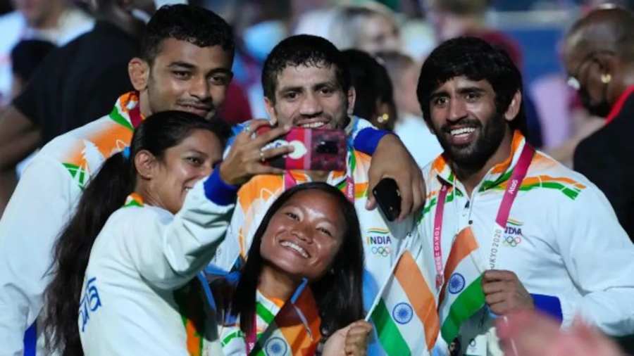 Indian athletes led by Bajrang Punia at the closing ceremony.